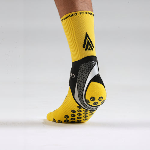 Seven Ankle Support with the sole and grip pads of the performance sock visible