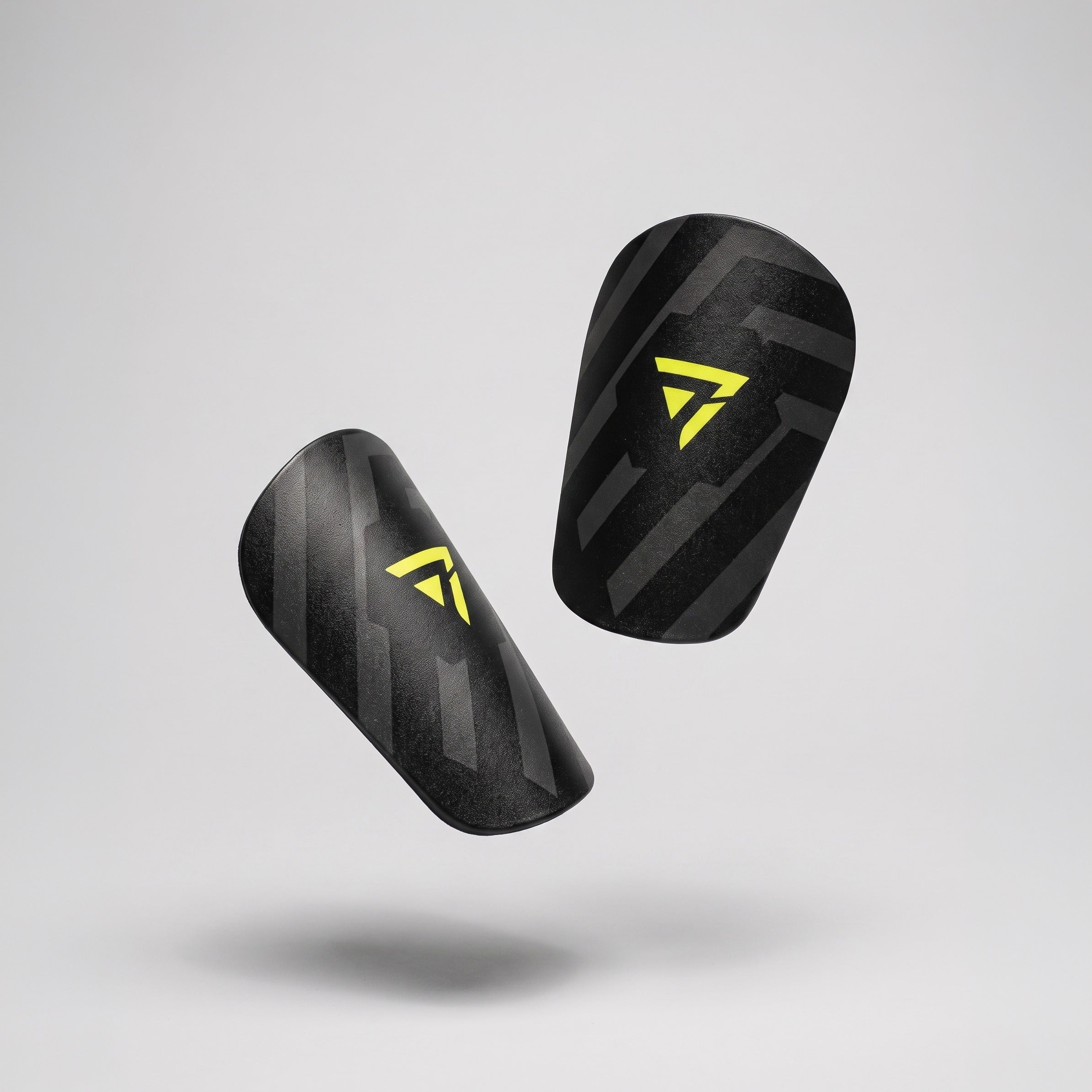 Seven Mini Shinpad pair floating on studio gray