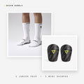 Seven Junior Layer bundle: white junior grip performance socks + Mini Shinpad